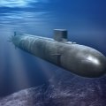 A grey aerodynamic submarine submerged in blue water